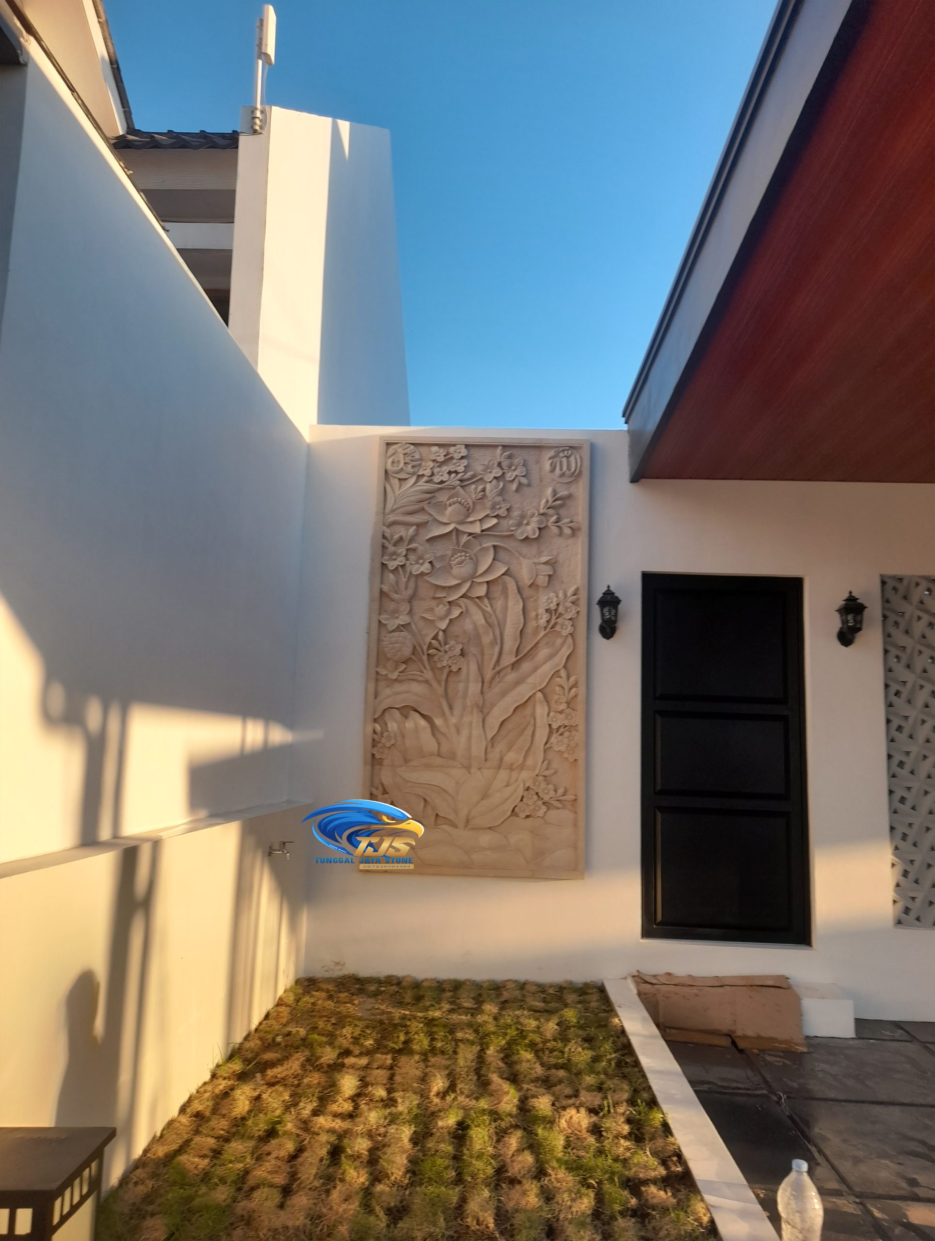 batu alam ukiran motif bunga